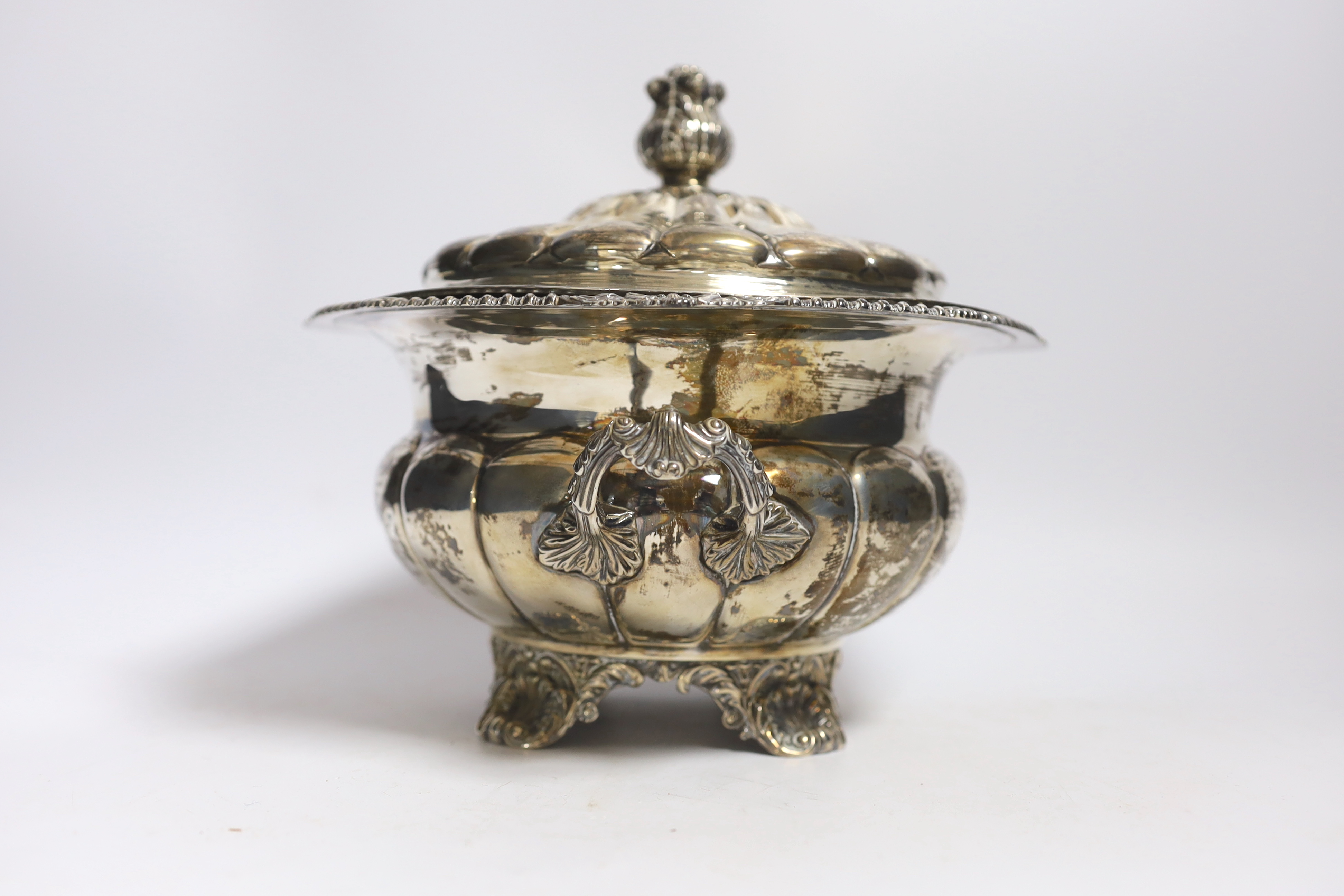 A George IV silver two handled vegetable tureen and cover, by Thomas Burwash, London, 1822 (marks on base rubbed), width over handles, 25cm, 36.5oz.